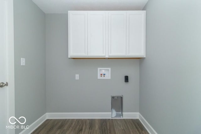 laundry room featuring dark wood-type flooring, cabinets, hookup for an electric dryer, and hookup for a washing machine