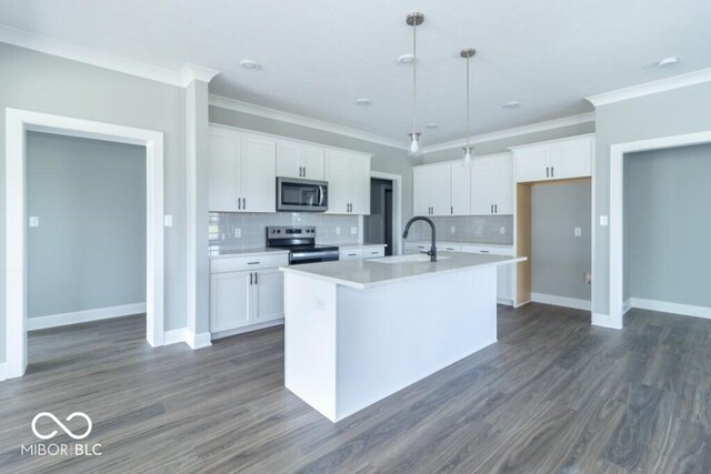 kitchen with appliances with stainless steel finishes, white cabinets, a kitchen island with sink, and dark hardwood / wood-style flooring