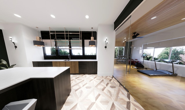 kitchen featuring hanging light fixtures and sink