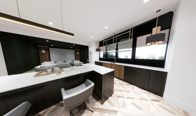 kitchen with light parquet floors, sink, and white cabinets