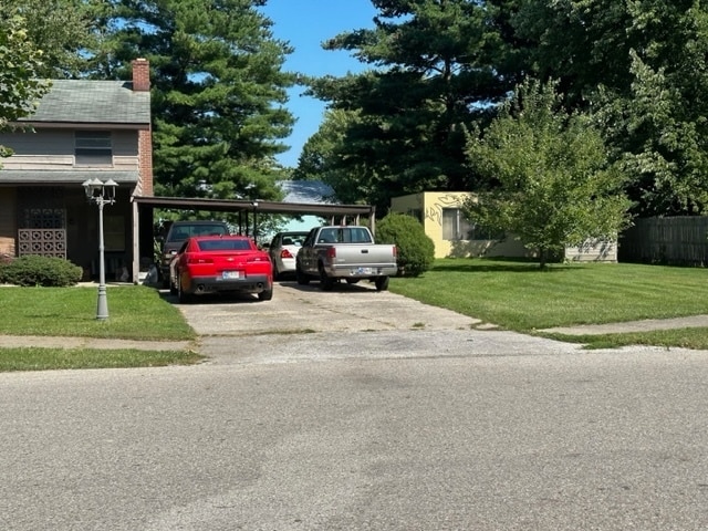 643 Pratt St, Greenfield, IN 46140 - view of car parking with a lawn