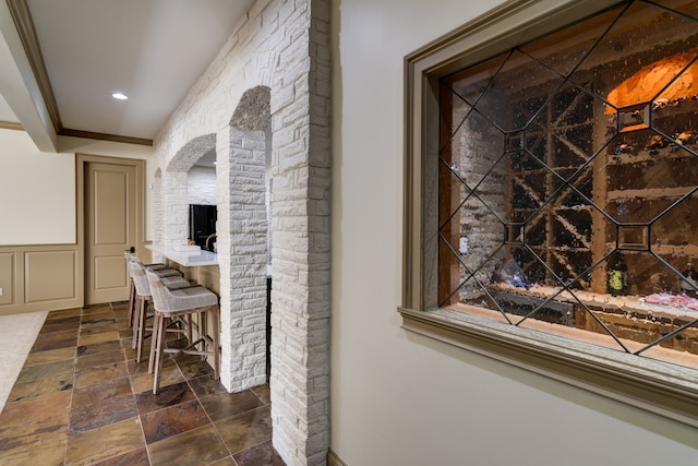 interior space featuring dark tile flooring