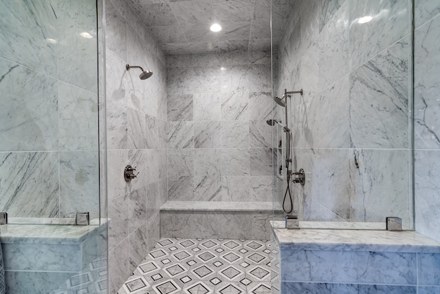 bathroom with tiled shower