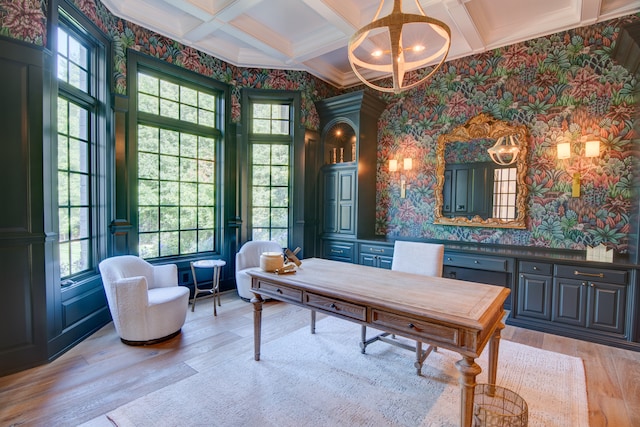 office featuring crown molding, beamed ceiling, coffered ceiling, an inviting chandelier, and light wood-type flooring