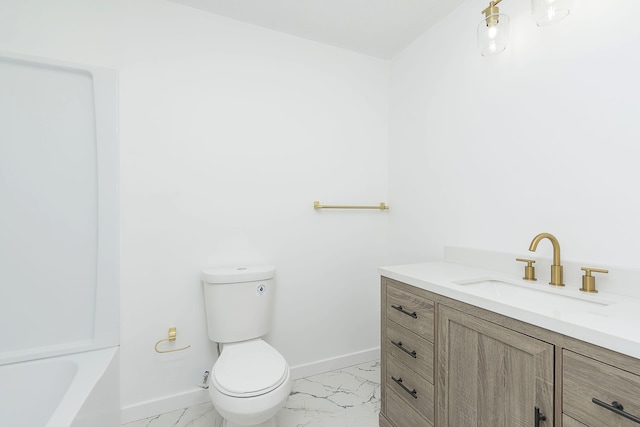 bathroom featuring vanity, tile floors, and toilet