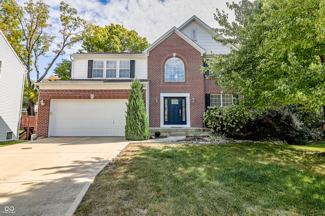 front of property with a garage and a front lawn