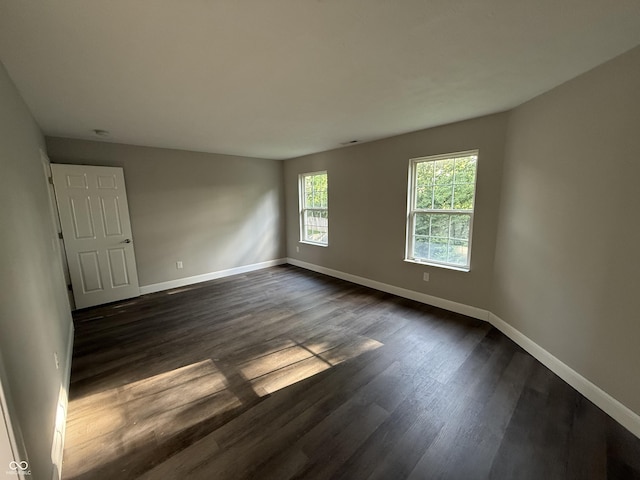 17902 Cristin Way, Westfield, IN 46062 - spare room featuring baseboards and dark wood-style floors