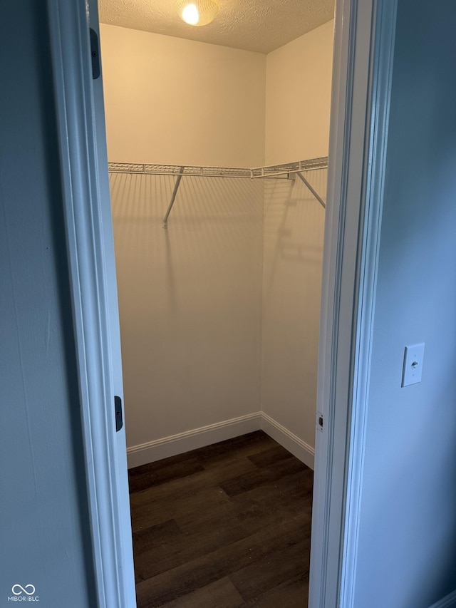 17902 Cristin Way, Westfield, IN 46062 - walk in closet with dark wood-type flooring