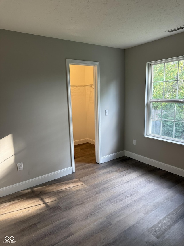 17902 Cristin Way, Westfield, IN 46062 - unfurnished room featuring dark wood-type flooring and baseboards