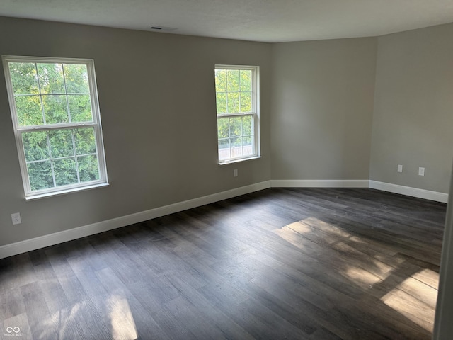 17902 Cristin Way, Westfield, IN 46062 - unfurnished room with baseboards and dark wood-style floors