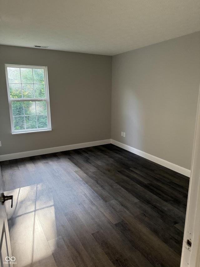 17902 Cristin Way, Westfield, IN 46062 - empty room with dark wood finished floors and baseboards