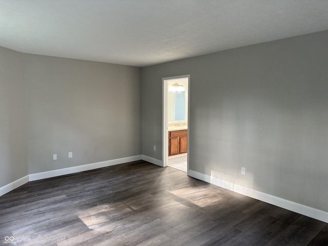 17902 Cristin Way, Westfield, IN 46062 - unfurnished room featuring baseboards and dark wood finished floors