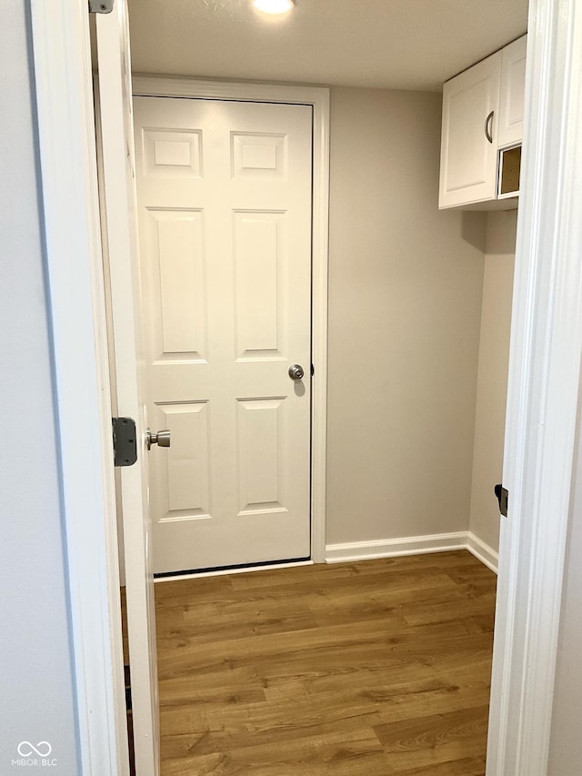 1327 Blue Ridge Ln, Brownsburg, IN 46112 - clothes washing area featuring wood finished floors and baseboards