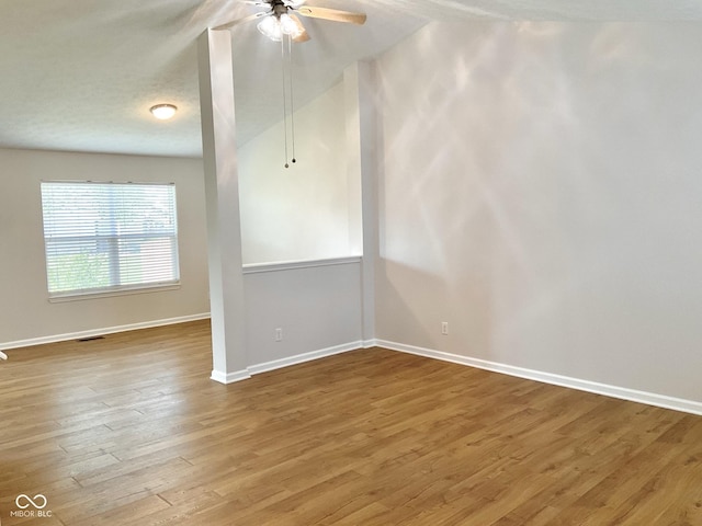 1327 Blue Ridge Ln, Brownsburg, IN 46112 - spare room featuring baseboards, wood finished floors, and ceiling fan