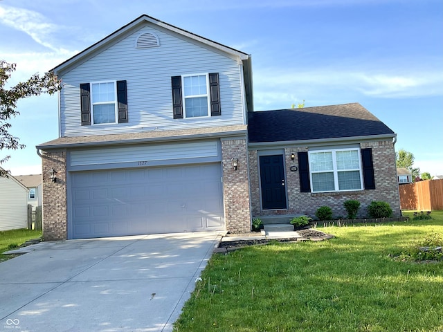 1327 Blue Ridge Ln, Brownsburg, IN 46112 - traditional-style house with an attached garage, brick siding, concrete driveway, and a shingled roof
