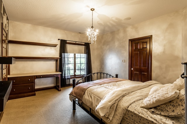 bedroom with light carpet and an inviting chandelier