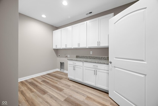 3368 Johns Way, Greenwood, IN 46143 - washroom with cabinet space, recessed lighting, baseboards, light wood finished floors, and washer hookup