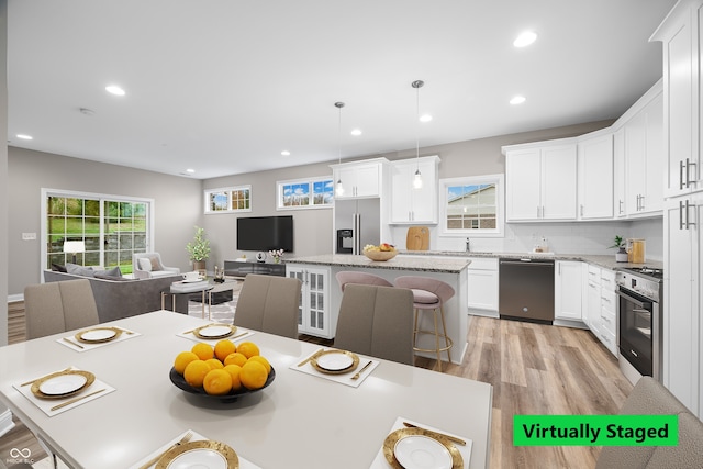 3368 Johns Way, Greenwood, IN 46143 - dining space with light wood-style floors and recessed lighting