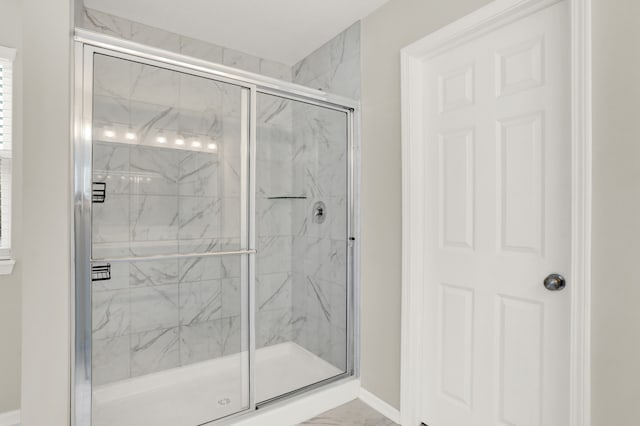 bathroom featuring walk in shower