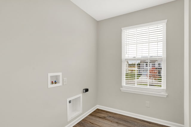 laundry room with plenty of natural light, hookup for a washing machine, and dark wood-type flooring