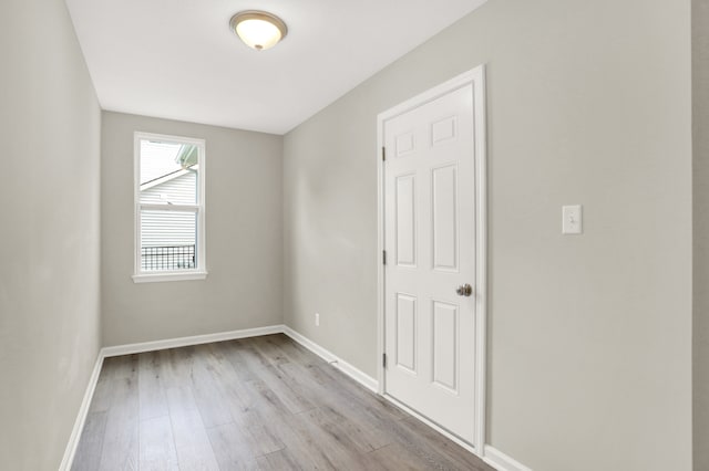 empty room with light wood-type flooring