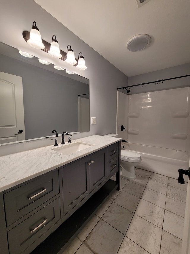 full bathroom featuring vanity, toilet, and  shower combination