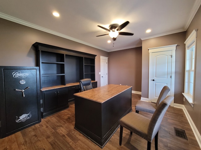 office area with crown molding, dark hardwood / wood-style flooring, and ceiling fan