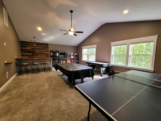 rec room featuring ceiling fan, bar, wooden walls, carpet, and billiards