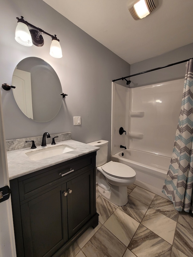 full bathroom featuring vanity, shower / tub combo, and toilet