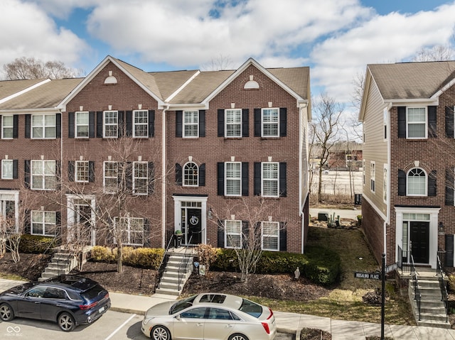 multi unit property featuring brick siding