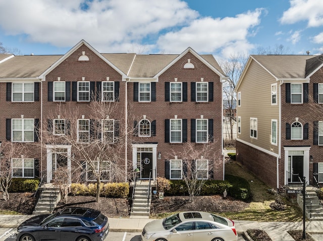 view of front of property with brick siding