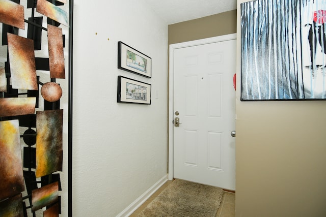 corridor featuring tile patterned floors