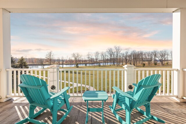 deck at dusk with a water view