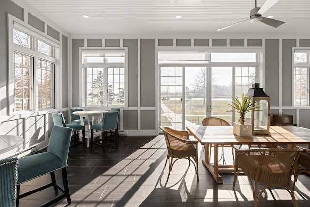 sunroom / solarium with ceiling fan