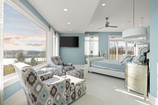 carpeted bedroom with ceiling fan, baseboards, and recessed lighting