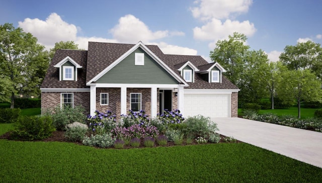 view of front of property featuring a garage and a front lawn