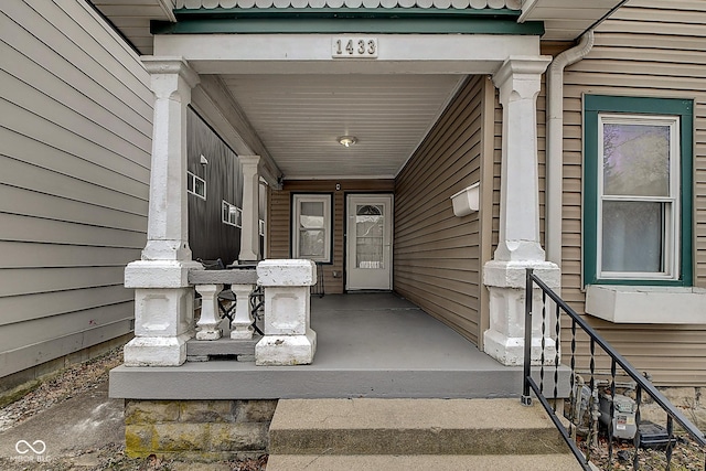 doorway to property with a porch