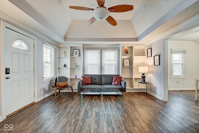 interior space with lofted ceiling, plenty of natural light, and wood finished floors