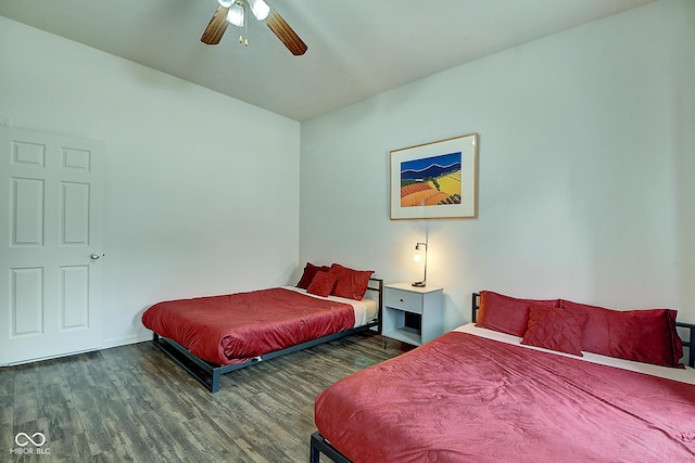 bedroom with a ceiling fan and wood finished floors