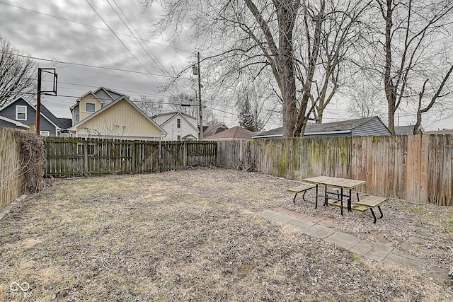 view of yard with a fenced backyard