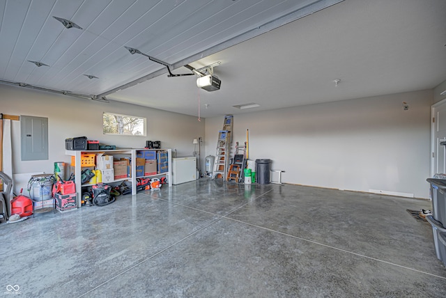 garage with electric panel and a garage door opener