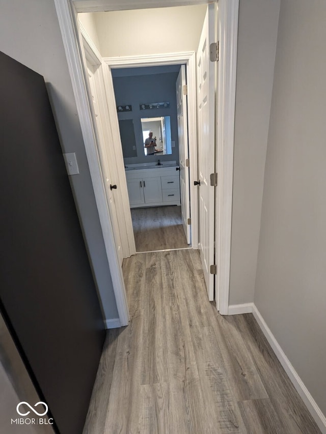 hall featuring light wood-type flooring