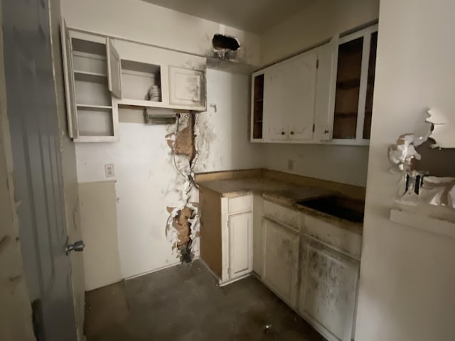 kitchen featuring white cabinetry