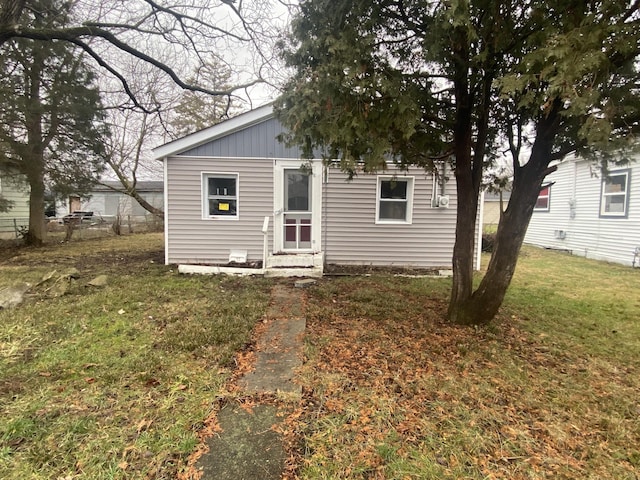 exterior space featuring a front lawn