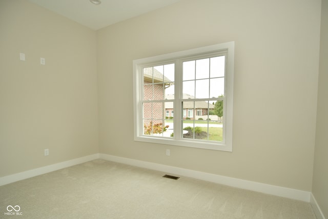 view of carpeted spare room