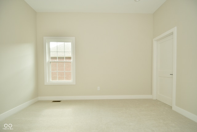 view of carpeted spare room