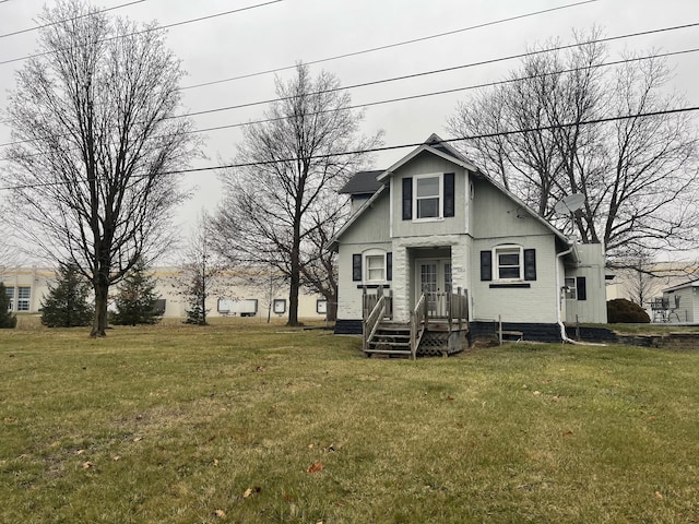 view of front of home with a front yard