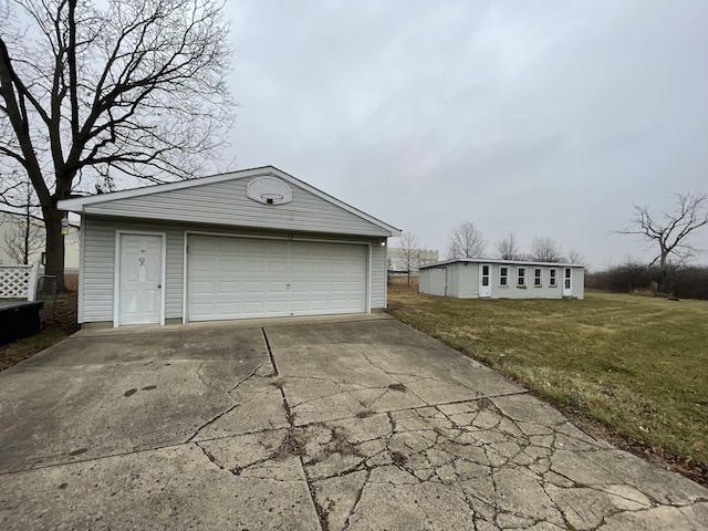 garage with a lawn