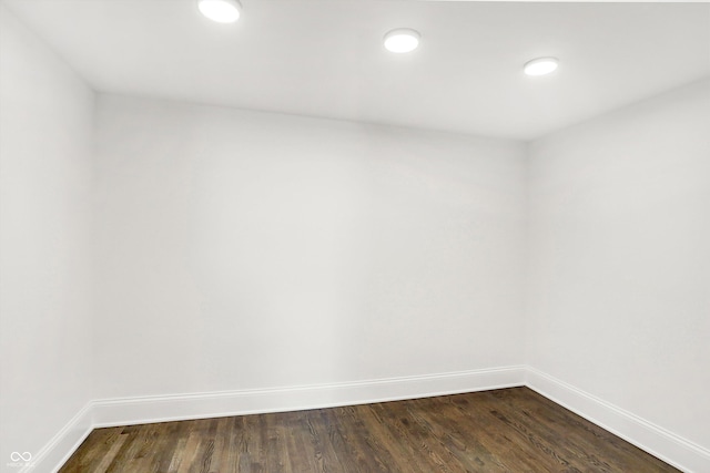 empty room featuring dark hardwood / wood-style floors