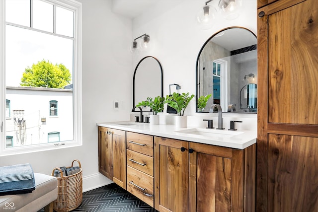 bathroom with vanity and plenty of natural light